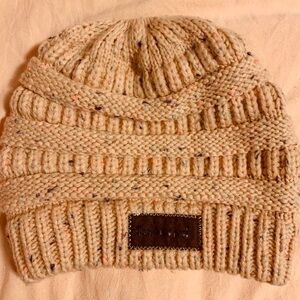 Three Birds Nest popcorn pink ponytail hat.